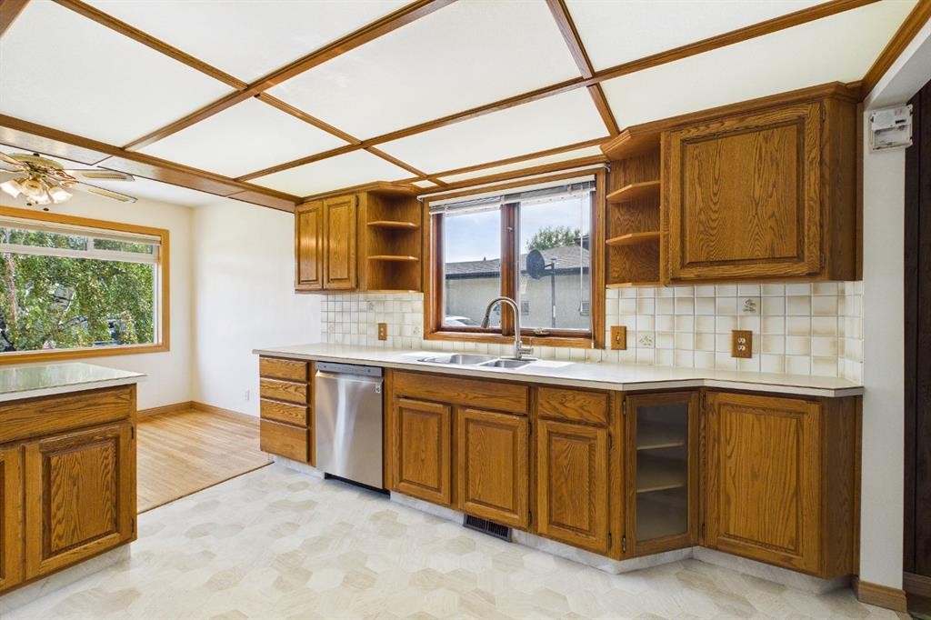 83 Westover Drive Sw, Calgary, AB - Indoor Photo Showing Kitchen With Double Sink