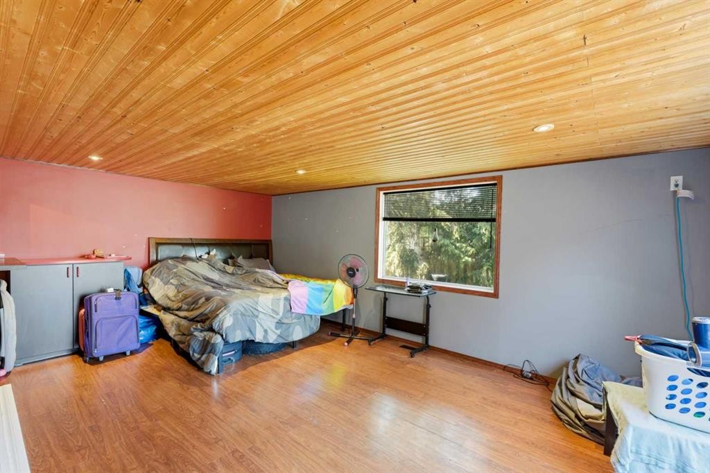 129 Big Hill Place Se, Airdrie, AB - Indoor Photo Showing Bedroom