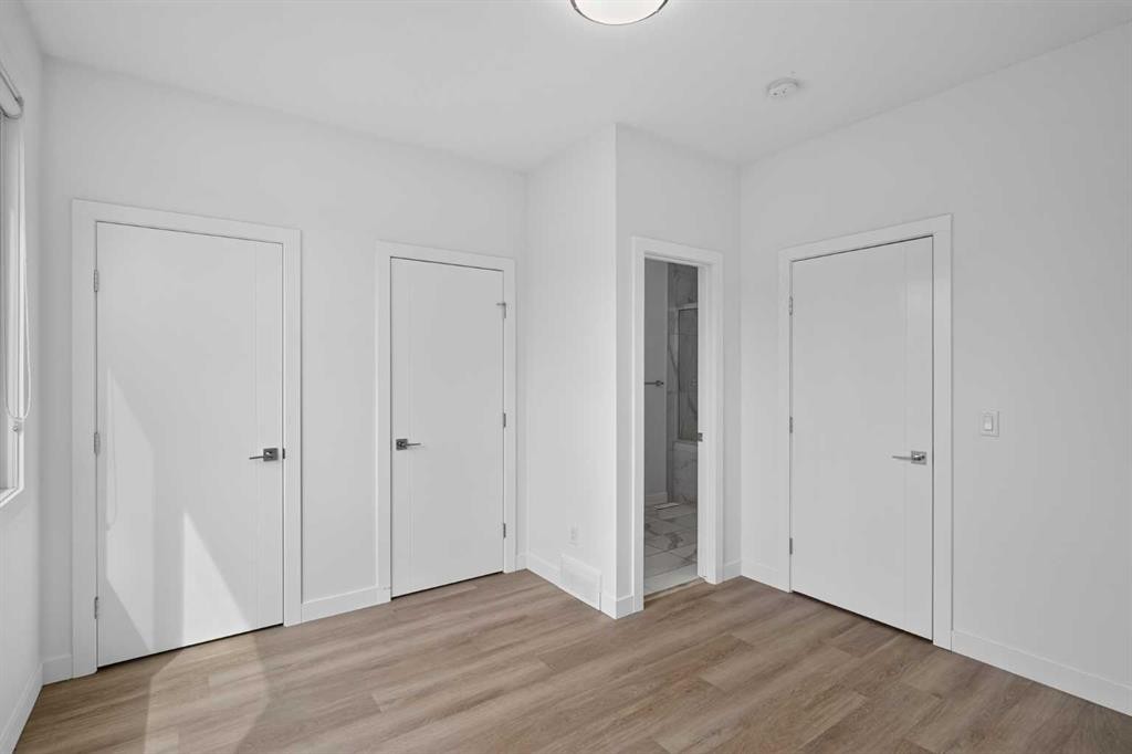 202-101 Panatella Square Nw, Calgary, AB - Indoor Photo Showing Other Room