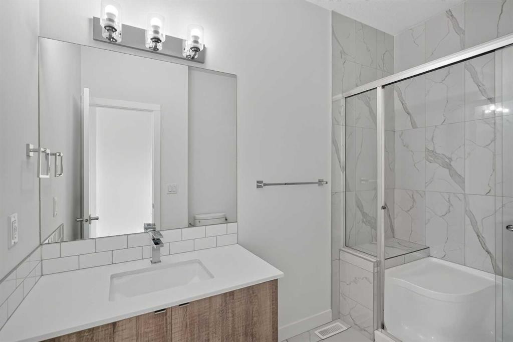 202-101 Panatella Square Nw, Calgary, AB - Indoor Photo Showing Bathroom