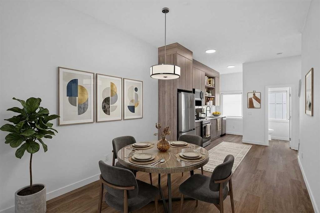 202-101 Panatella Square Nw, Calgary, AB - Indoor Photo Showing Dining Room