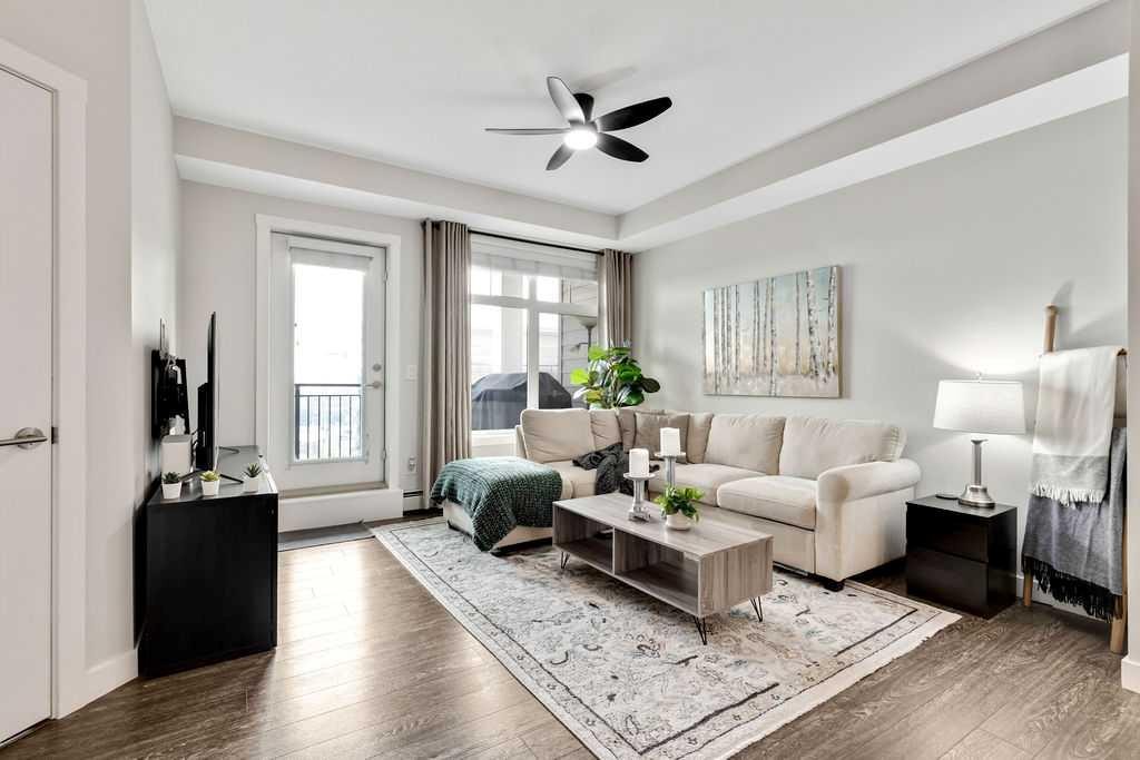2310-3727 Sage Hill Drive Nw, Calgary, AB - Indoor Photo Showing Living Room