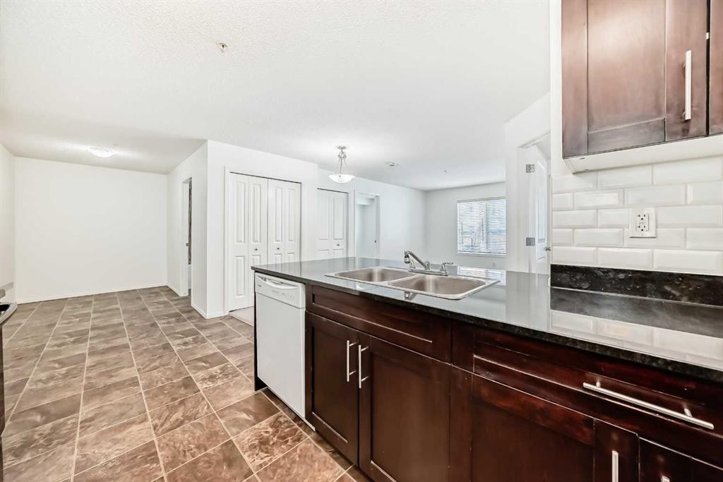 111-195 Kincora Glen Road Nw, Calgary, AB - Indoor Photo Showing Kitchen With Double Sink