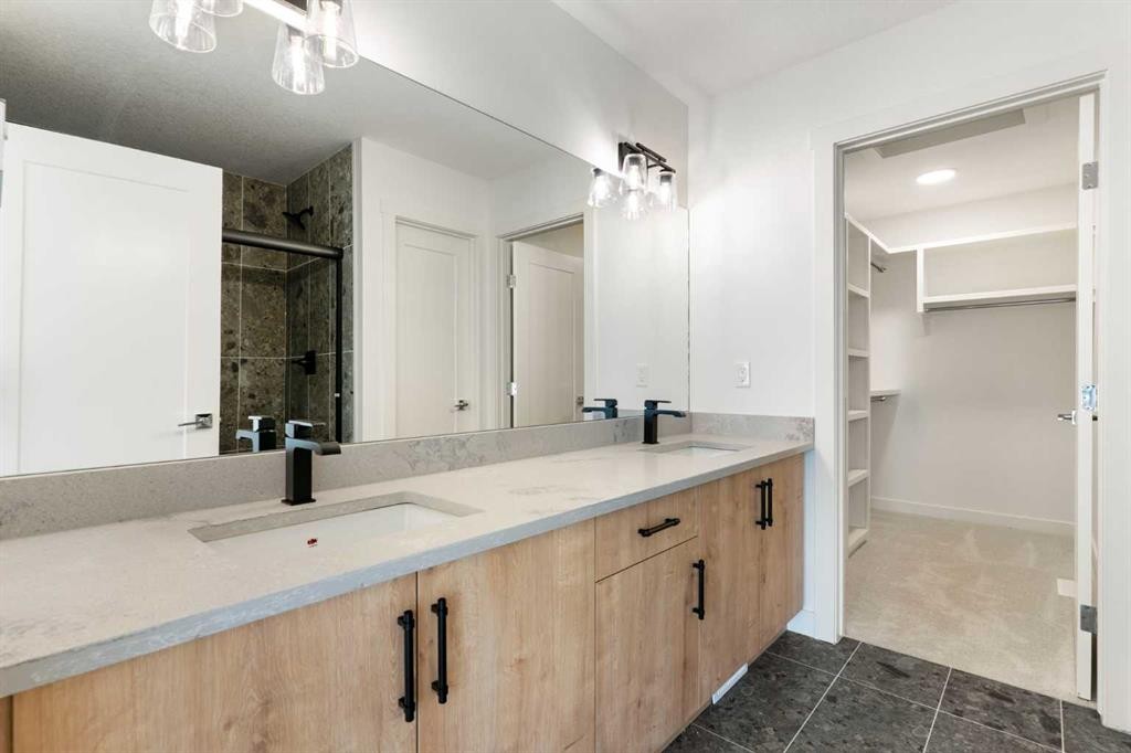 91 Heritage Manor, Cochrane, AB - Indoor Photo Showing Bathroom