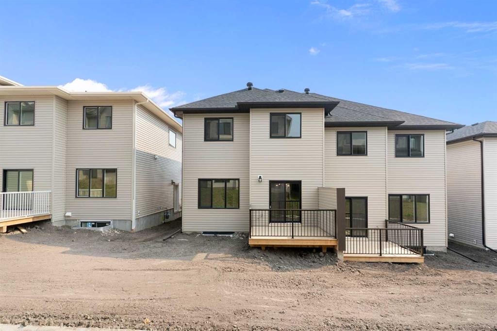 91 Heritage Manor, Cochrane, AB - Outdoor With Exterior