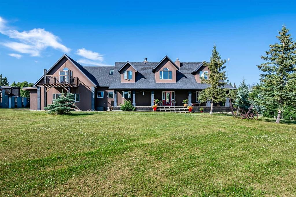 311068 Parkins Road West, Rural Foothills County, AB - Outdoor With Deck Patio Veranda With Facade
