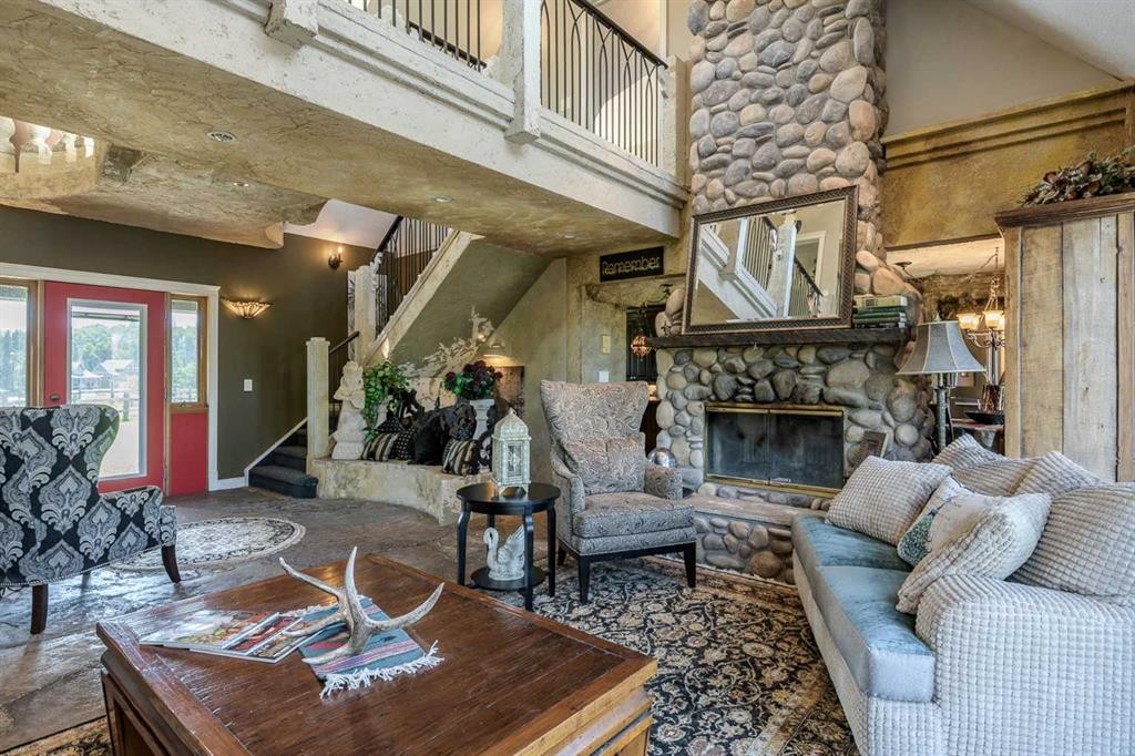 311068 Parkins Road West, Rural Foothills County, AB - Indoor Photo Showing Living Room With Fireplace
