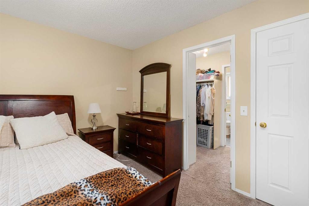 232 Harvest Glen Place Ne, Calgary, AB - Indoor Photo Showing Bedroom