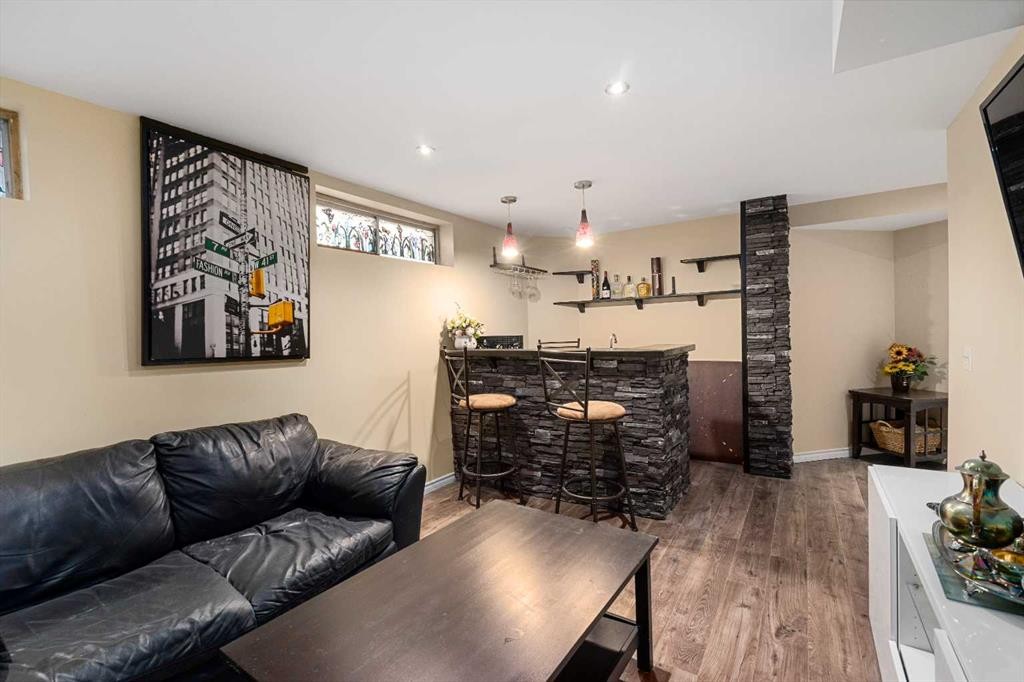 232 Harvest Glen Place Ne, Calgary, AB - Indoor Photo Showing Living Room