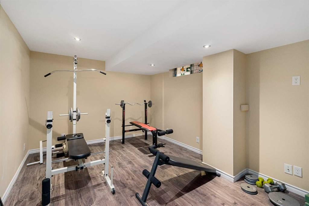 232 Harvest Glen Place Ne, Calgary, AB - Indoor Photo Showing Gym Room