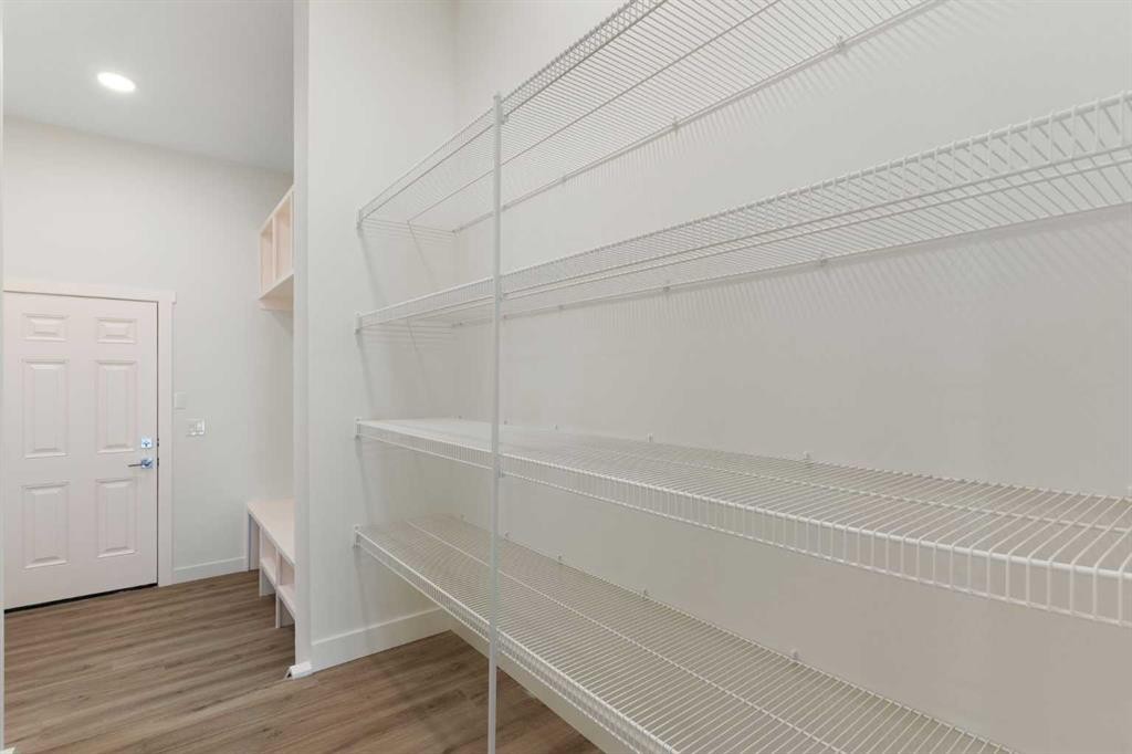 83 Heritage Manor, Cochrane, AB - Indoor With Storage