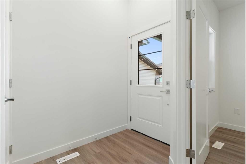 83 Heritage Manor, Cochrane, AB - Indoor Photo Showing Other Room