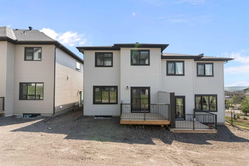 83 Heritage Manor, Cochrane, AB - Outdoor With Exterior