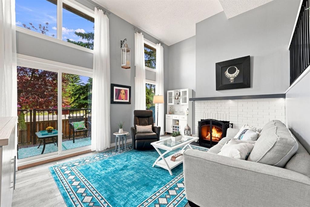 20-8533 Silver Springs Road Nw, Calgary, AB - Indoor With Fireplace