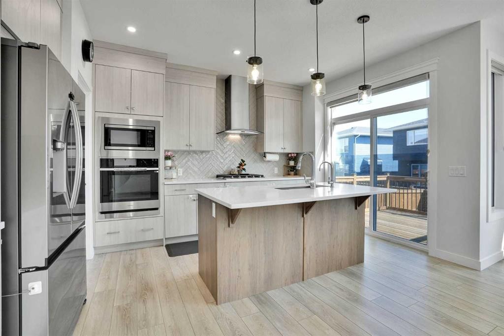45 Dawson Gardens, Chestermere, AB - Indoor Photo Showing Kitchen With Upgraded Kitchen
