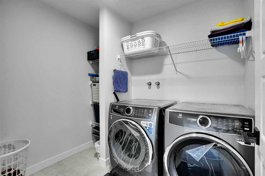 45 Dawson Gardens, Chestermere, AB - Indoor Photo Showing Laundry Room