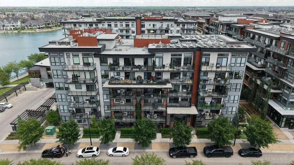 105-2231 Mahogany Boulevard Se, Calgary, AB - Outdoor With Body Of Water