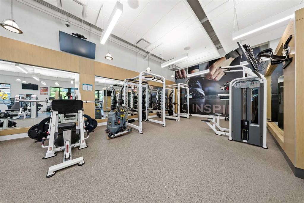 105-2231 Mahogany Boulevard Se, Calgary, AB - Indoor Photo Showing Gym Room