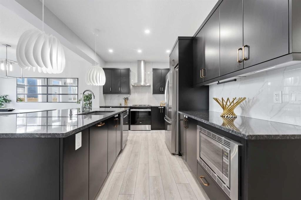51 Setonstone Row Se, Calgary, AB - Indoor Photo Showing Kitchen With Stainless Steel Kitchen With Upgraded Kitchen