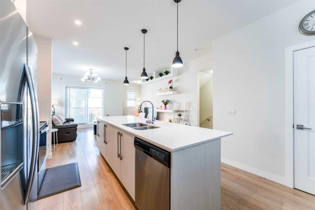 402-72 Cornerstone Manor Ne, Calgary, AB - Indoor Photo Showing Kitchen With Double Sink With Upgraded Kitchen
