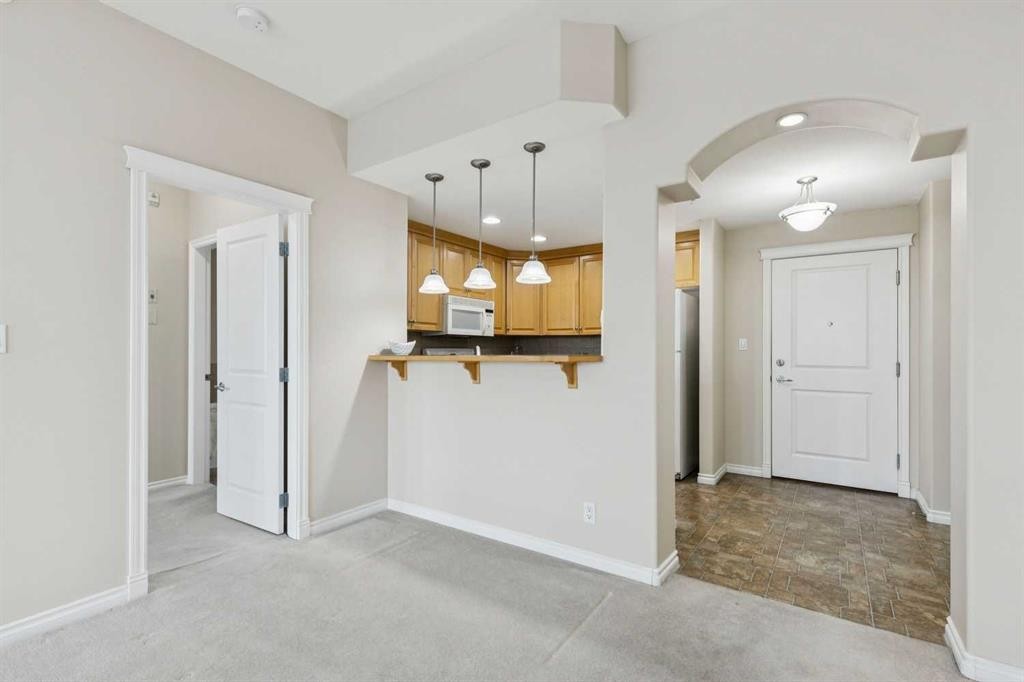 705-1726 14 Avenue Nw, Calgary, AB - Indoor Photo Showing Other Room