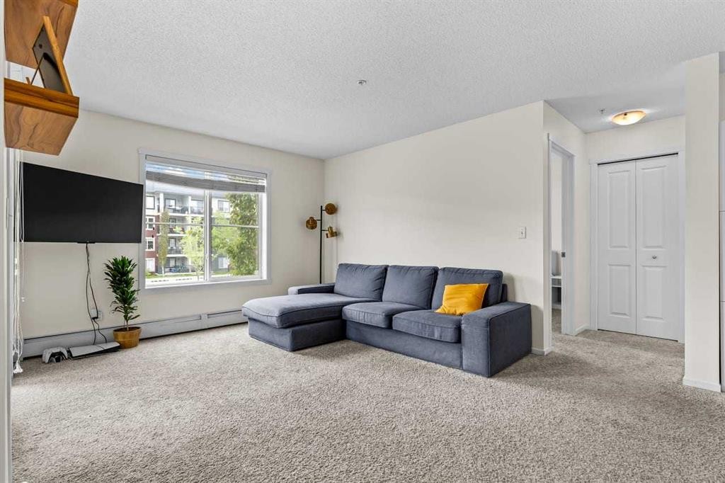 2201-81 Legacy Boulevard Se, Calgary, AB - Indoor Photo Showing Living Room