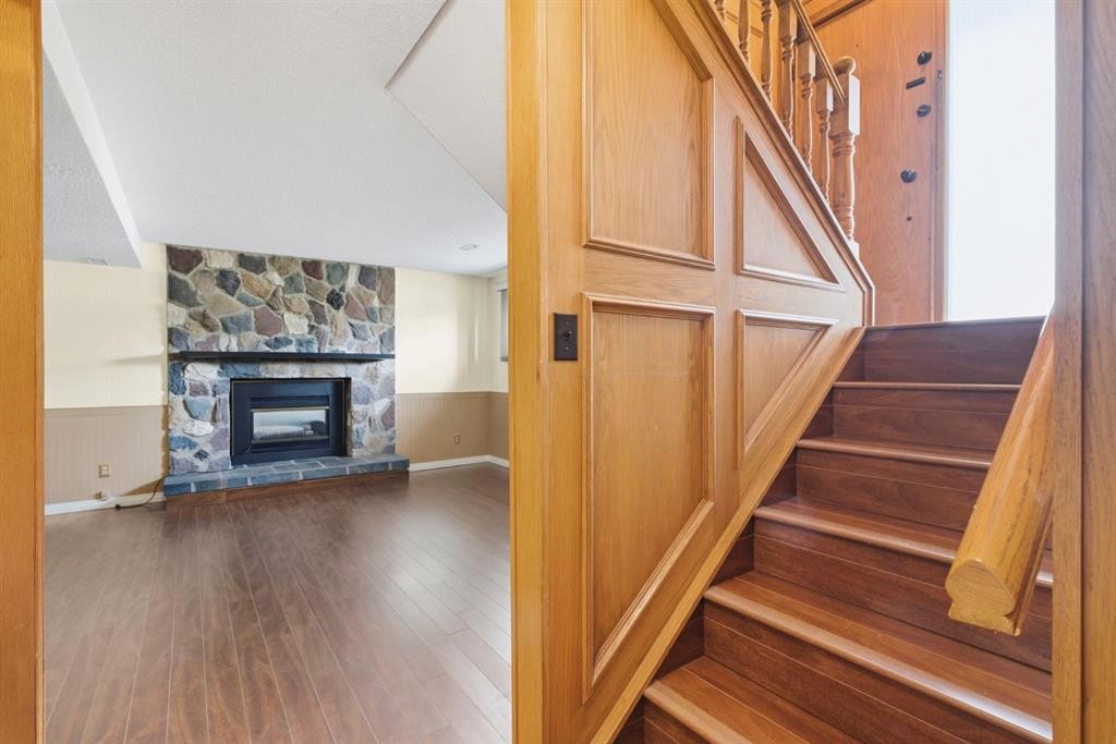 160 Marbrooke Circle Ne, Calgary, AB - Indoor With Fireplace