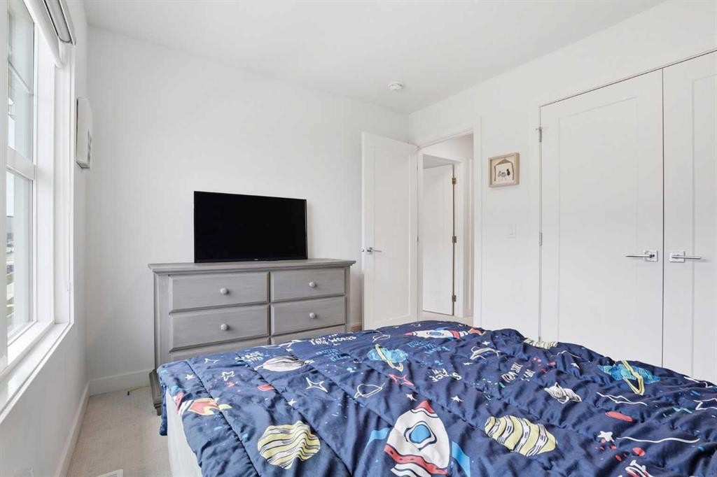 154 Merganser Drive West, Chestermere, AB - Indoor Photo Showing Bedroom