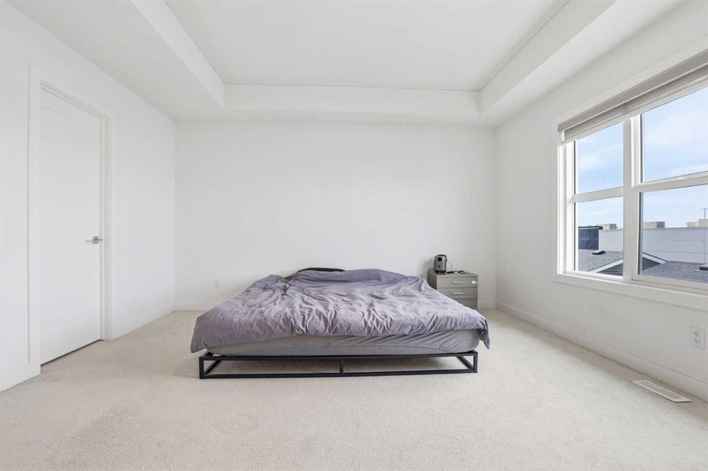 154 Merganser Drive West, Chestermere, AB - Indoor Photo Showing Bedroom