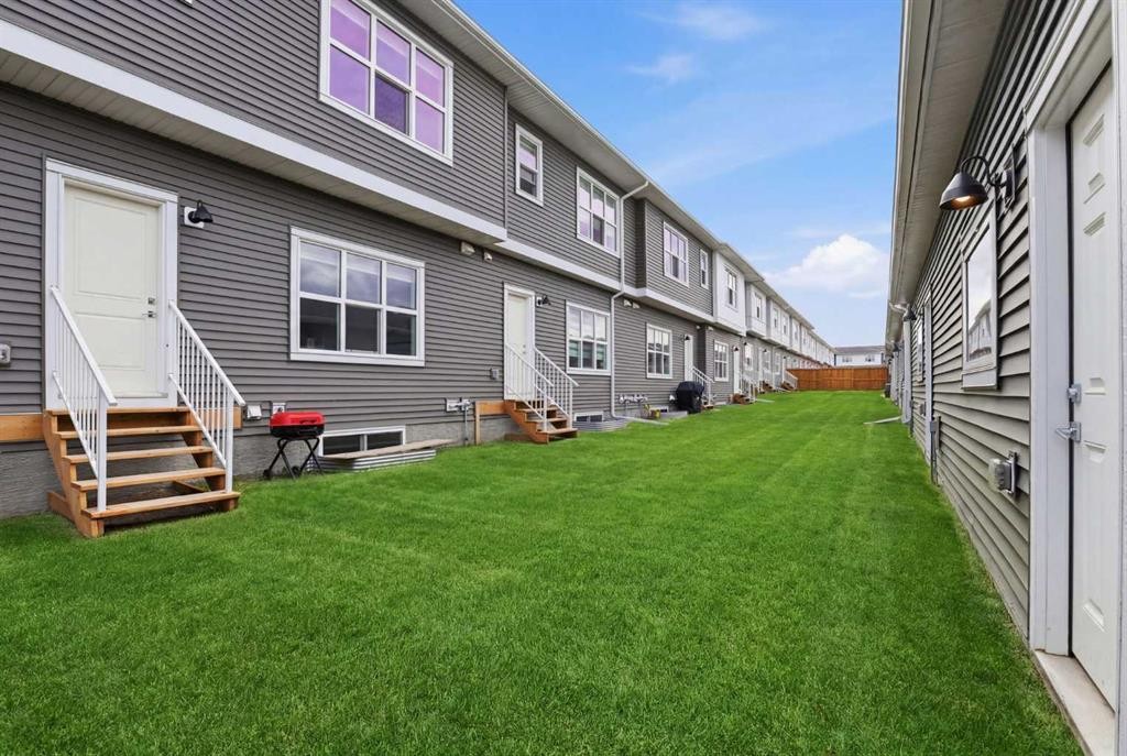 154 Merganser Drive West, Chestermere, AB - Outdoor With Exterior