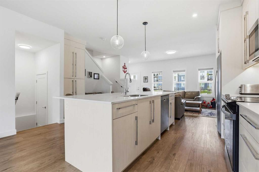 154 Merganser Drive West, Chestermere, AB - Indoor Photo Showing Kitchen With Upgraded Kitchen