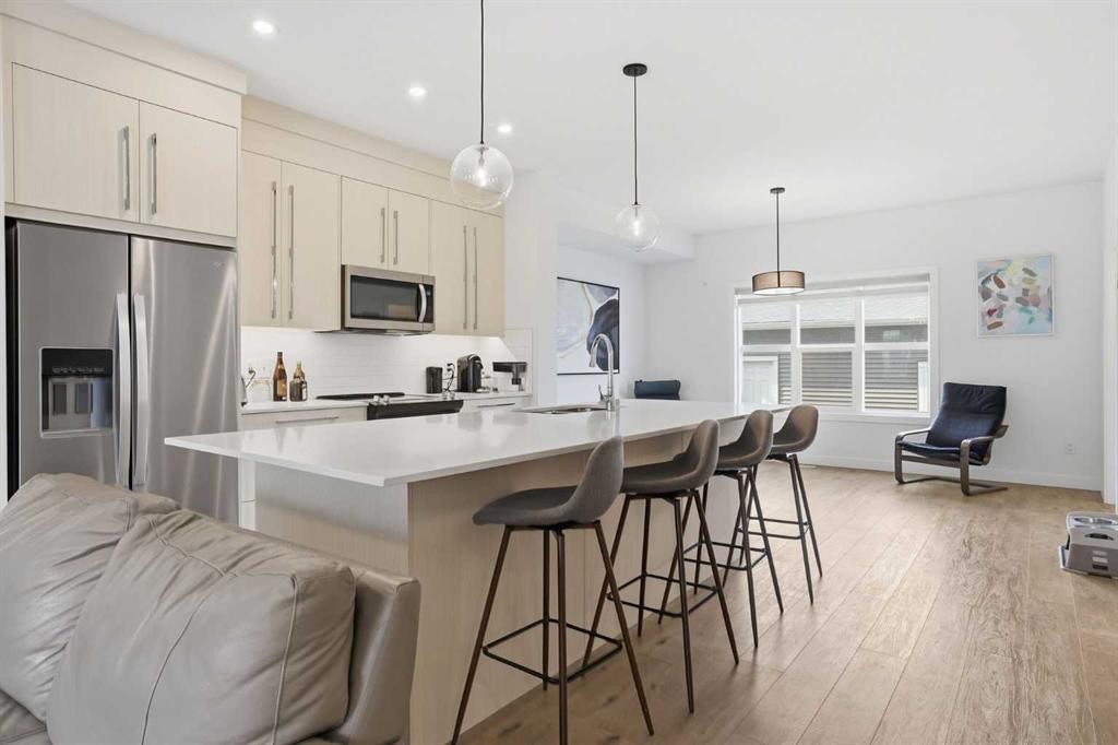154 Merganser Drive West, Chestermere, AB - Indoor Photo Showing Kitchen With Stainless Steel Kitchen With Upgraded Kitchen