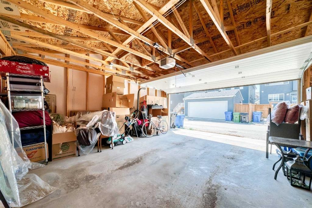 20893 Main Street Se, Calgary, AB - Indoor Photo Showing Garage