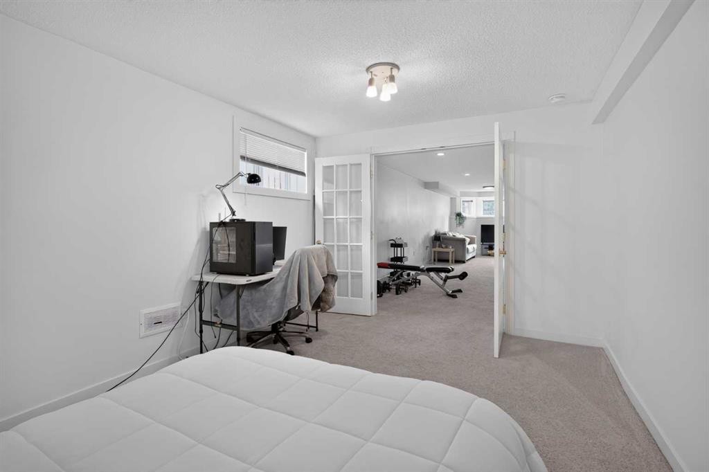 113 Mt Lorette Place Se, Calgary, AB - Indoor Photo Showing Bedroom