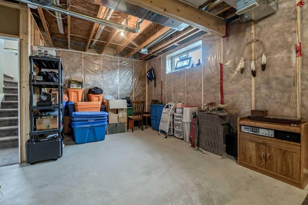 86 Legacy Common Se, Calgary, AB - Indoor Photo Showing Basement