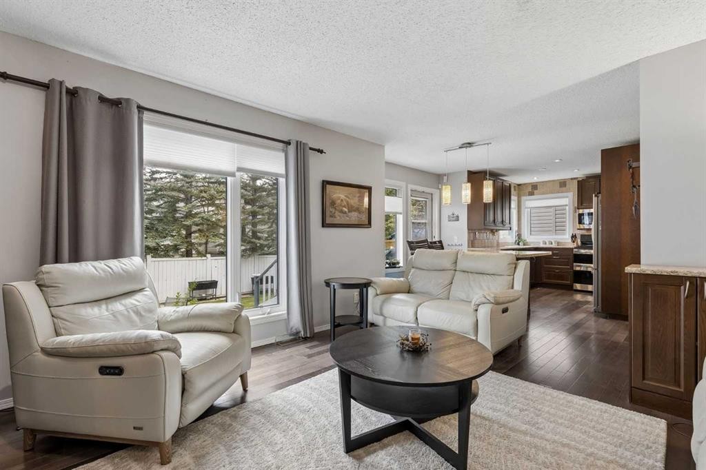 244 Scurfield Place Nw, Calgary, AB - Indoor Photo Showing Living Room