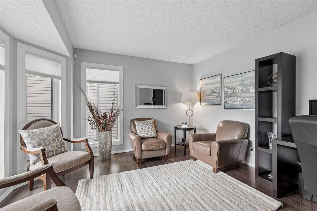 244 Scurfield Place Nw, Calgary, AB - Indoor Photo Showing Living Room
