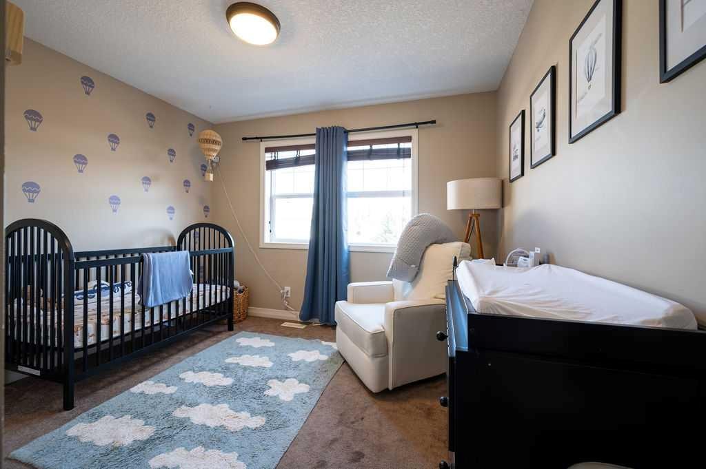 21 Chaparral Valley Court Se, Calgary, AB - Indoor Photo Showing Bedroom