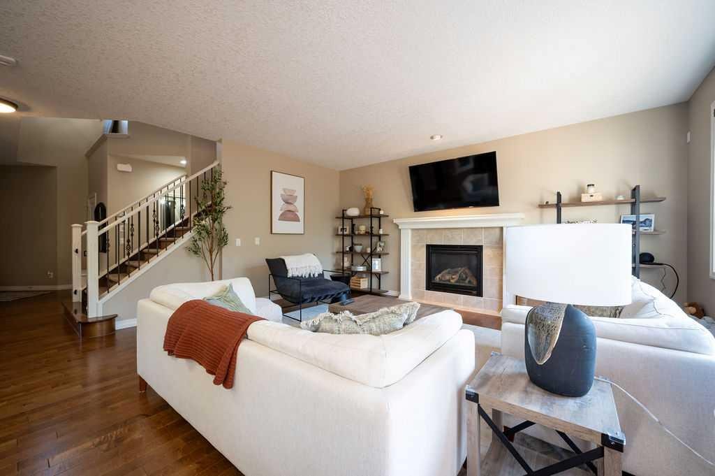 21 Chaparral Valley Court Se, Calgary, AB - Indoor Photo Showing Living Room With Fireplace