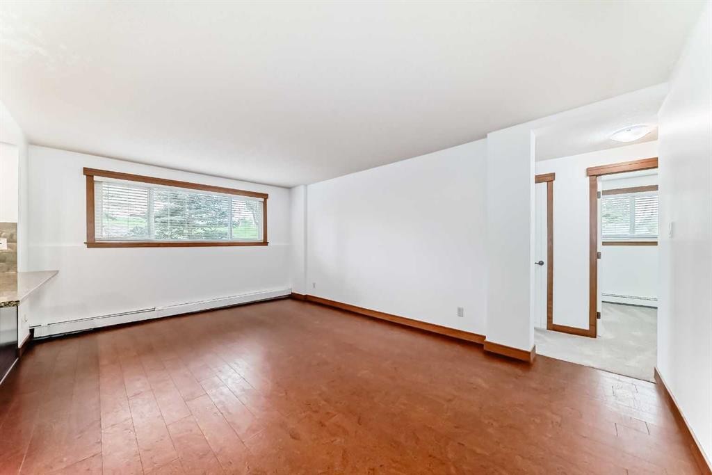 112-315 50 Avenue Sw, Calgary, AB - Indoor Photo Showing Other Room