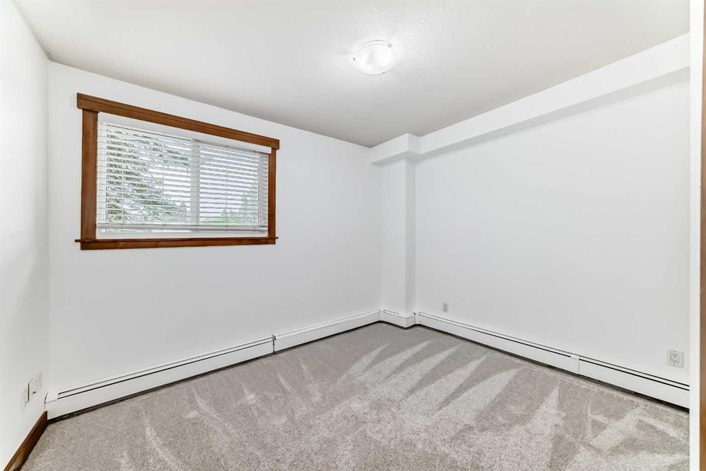112-315 50 Avenue Sw, Calgary, AB - Indoor Photo Showing Other Room