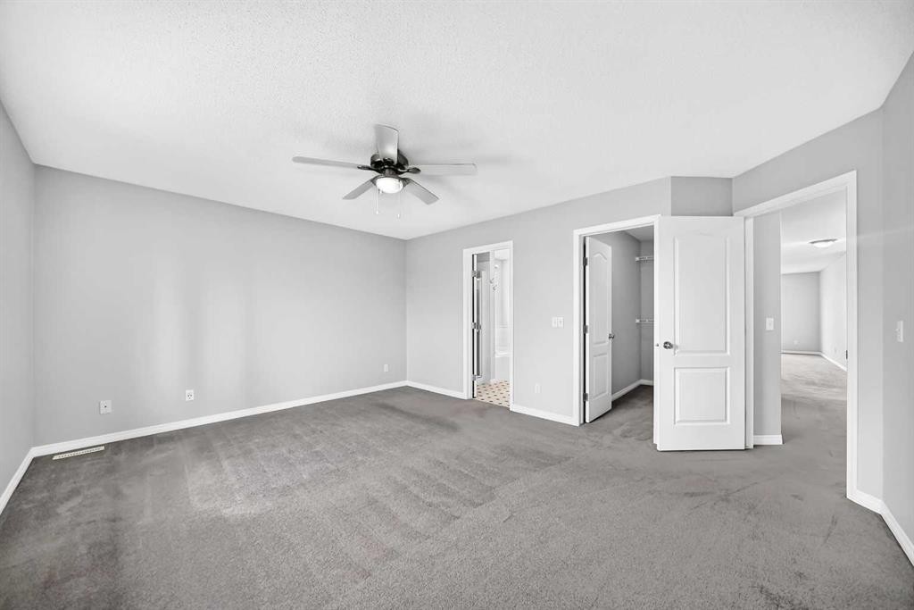 171 Oakmere Green, Chestermere, AB - Indoor Photo Showing Other Room