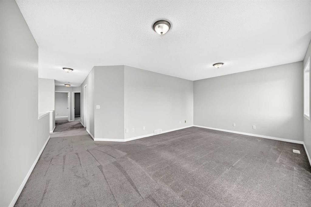171 Oakmere Green, Chestermere, AB - Indoor Photo Showing Other Room