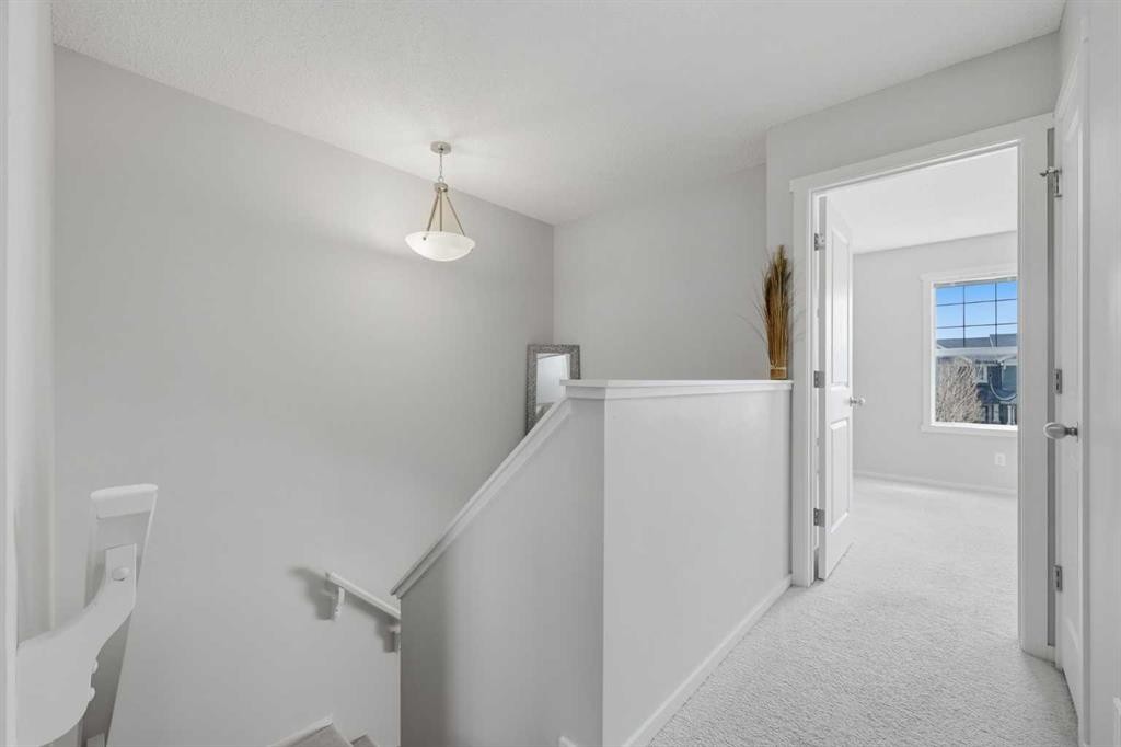 93 Sunvalley Road, Cochrane, AB - Indoor Photo Showing Other Room