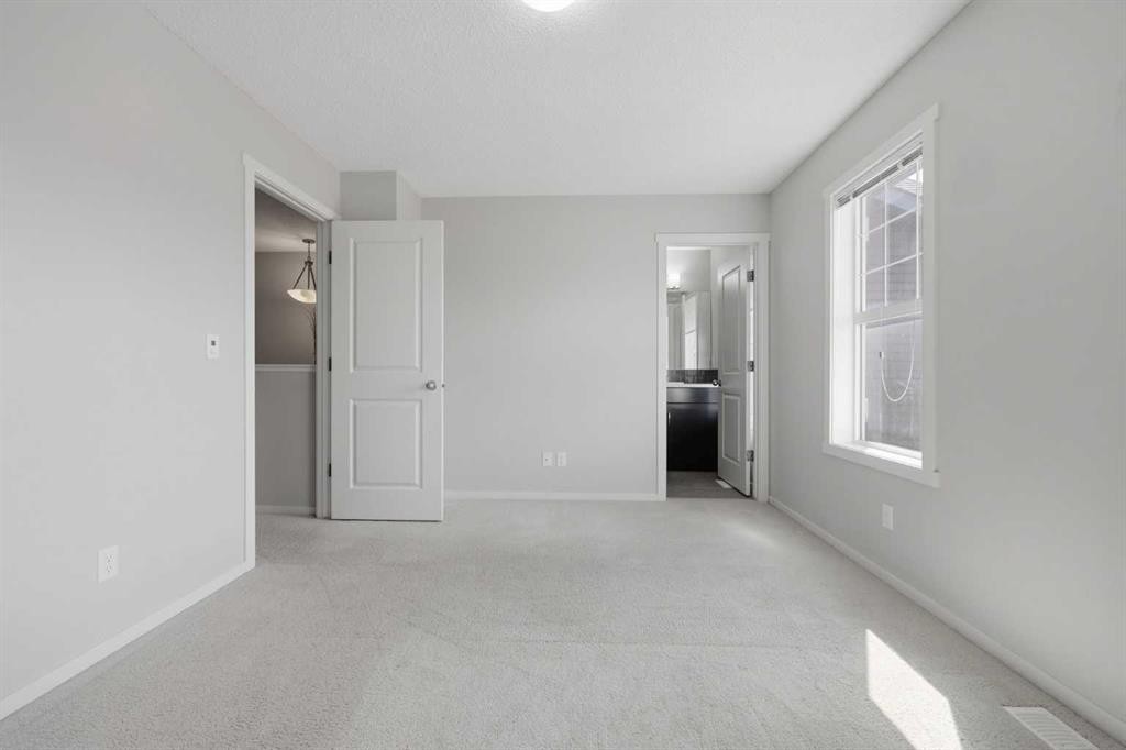 93 Sunvalley Road, Cochrane, AB - Indoor Photo Showing Other Room