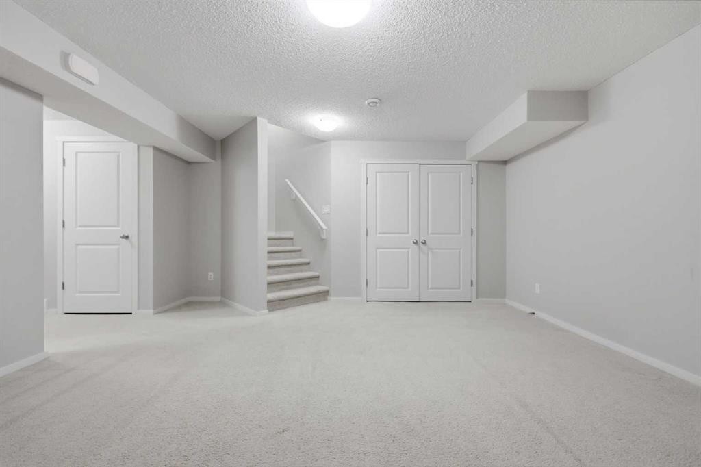 93 Sunvalley Road, Cochrane, AB - Indoor Photo Showing Other Room