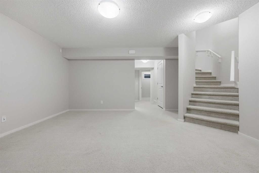 93 Sunvalley Road, Cochrane, AB - Indoor Photo Showing Other Room