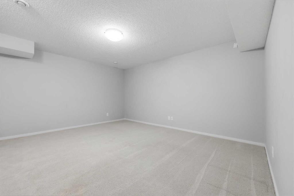 93 Sunvalley Road, Cochrane, AB - Indoor Photo Showing Other Room