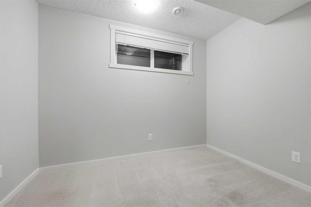93 Sunvalley Road, Cochrane, AB - Indoor Photo Showing Other Room