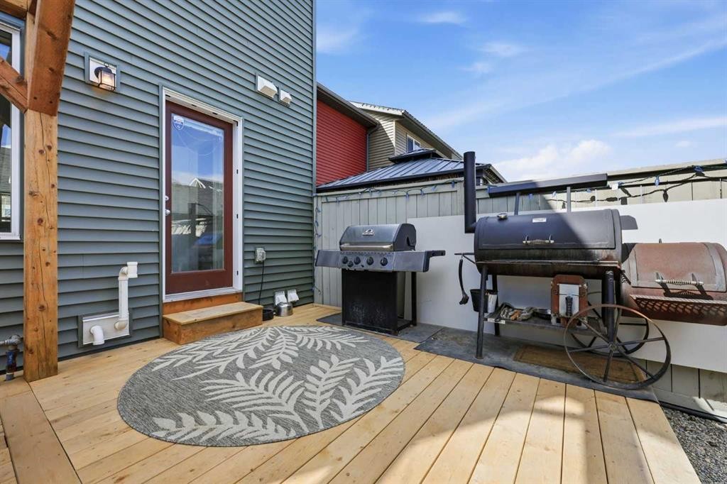 93 Sunvalley Road, Cochrane, AB - Outdoor With Deck Patio Veranda With Exterior